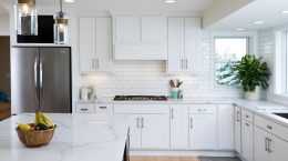 Kitchen with white cabinetry and quartz countertops